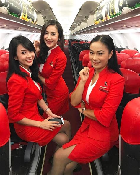 21 slightly racy photos of the hottest female cabin crew the airlines tried to ban met