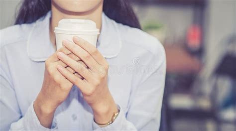 Closeup Young Asian Woman Drinking Coffee And Smile In The Morning At