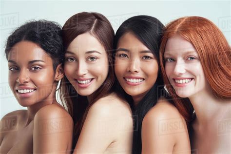 Multi Ethnic Nude Women Posing Together Stock Photo Dissolve
