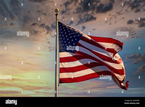 American Flag In Dramatic Sunset Stock Photo Alamy