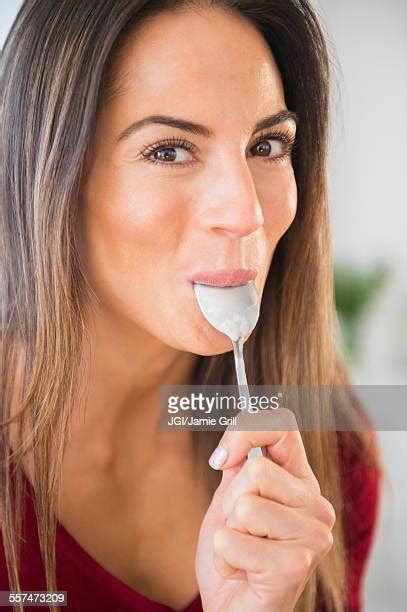 Women Eat Spoon Photos Et Images De Collection Getty Images