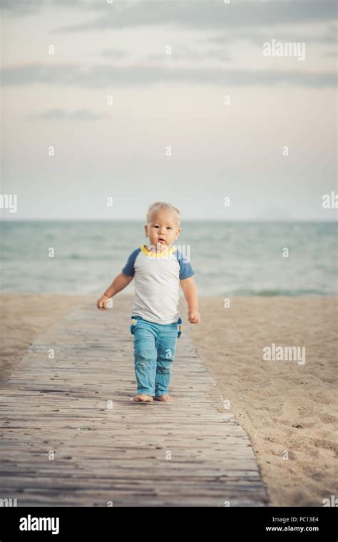 Baby Walking Stock Photo Alamy