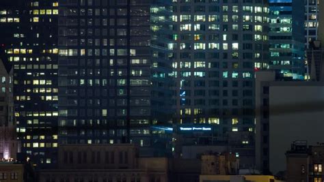 4k Windows Of Office Buildings Illuminated At Night In Downtown Los