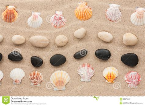 Frame Made Of Seashell And Stone On A Wavy Sand Stock Image Image Of