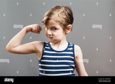 Boys Showing Muscles Hi Res Stock Photography And Images Alamy
