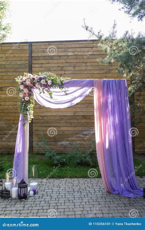 Purple Wedding Arch Decorated With Flowers Lilac And Pink Material
