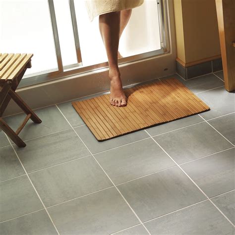 How To Lay Tile Install A Ceramic Tile Floor In The Bathroom Diy