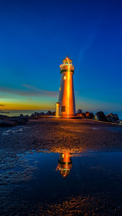 Lighthouse In Beach At Sunset Wallpaper Id6166