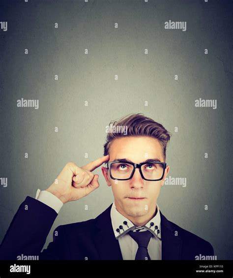 Young Nerdy Man With Glasses Looking Up Stock Photo Alamy