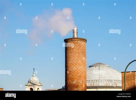 Close Up Of Beautiful Arabesque White Chimney On The Roof Rising Up In