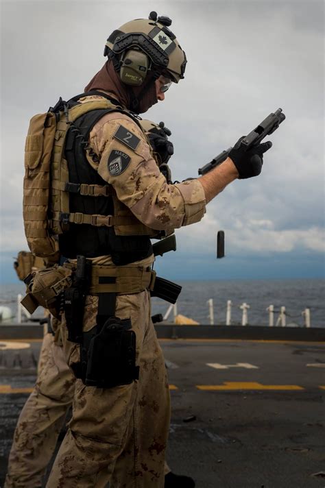 A Member Of The Maritime Tactical Operation Group Rcn Practicing His
