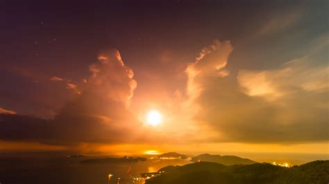1920x1080 Sun Lights Sunset Evening Islands Clouds Bay Mountains