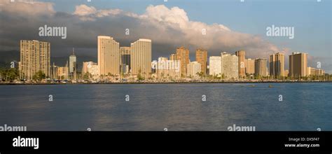Honolulu And Waikiki Skyline From Ala Moana Park Hawaii Usa At Sunset