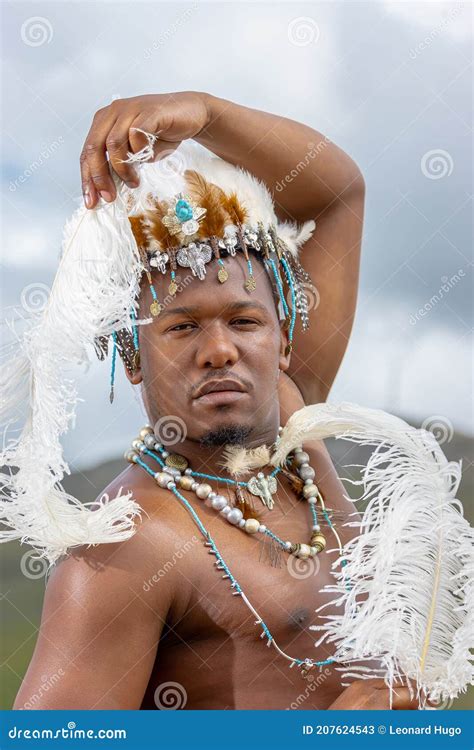 A Traditional African Dressed Male With A Beaded Headdress With Ostrich Feathers Stock Image