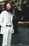 John Lennon in his classic white suit as worn on the Abbey Road cover ...