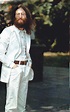 John Lennon in his classic white suit as worn on the Abbey Road cover ...
