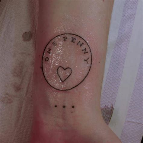 Adeles Left Wrist Tattoos One Penny To Honor Her Mom And Three Dots