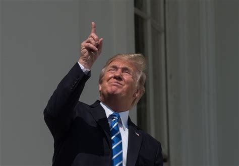 Trump Looks Directly At Eclipse Sparks Internet Meme