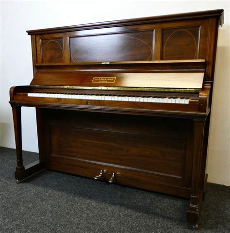 J And J Hopkinson Antique Upright Piano In Mahogany Finish With Oval Inl