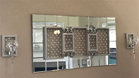 Did you know that mirrors give the impression of extra space? Dollar Tree Diy | Glam Wall Mirror And Sconces | Diy mirror, Diy dollar tree decor, Dollar tree diy