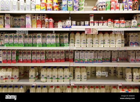 Milk Shelf In A Supermarket Stock Photo Alamy