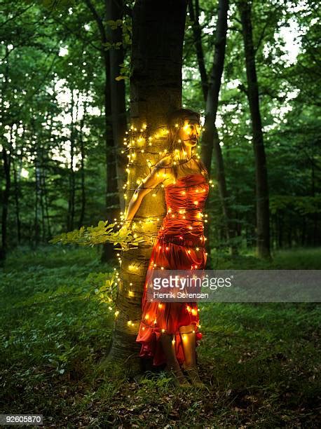 Woman Tied To Tree Photos And Premium High Res Pictures Getty Images