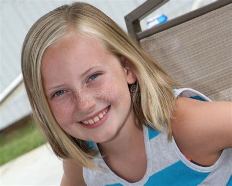 Outdoor Head Shot Of A 9 Year Old Girl Stock Image Image Of Innocent