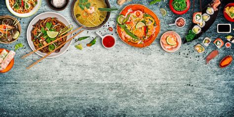 Asian Food Background With Various Ingredients On Rustic Stone
