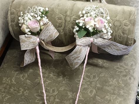 flower girl wands with spray roses white gypsophila hessian and lace ribbon rustic style