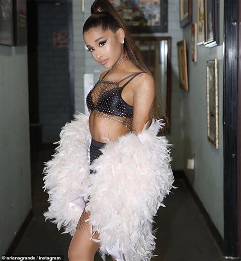 Ariana Grande Shows Off Ample Cleavage And Flat Stomach In Risque