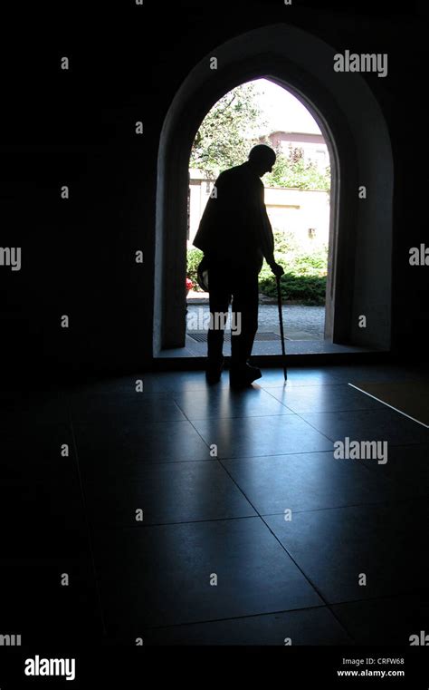 Silhouette Of An Old Man With Cane Stock Photo Alamy