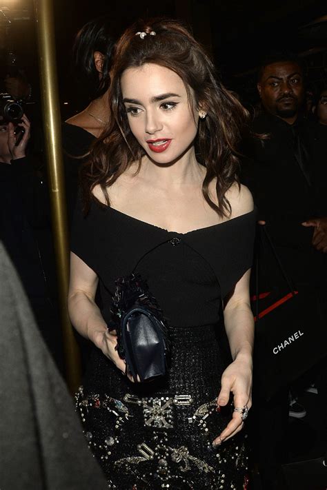 Lily Collins Leaving The Chanel And Charles Finch Pre Oscar Party In
