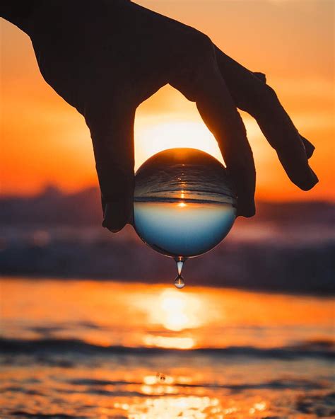 A Interesting Mix Of Water Drop Photography And A Sunset Captured By