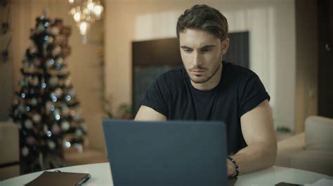 Frustrated Man Working On Laptop Computer At Home Annoyed Guy Have