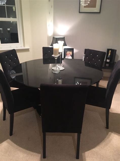 The cane backs on these chairs were looking pretty rough because the finish had been worn so i decided to change directions. 6 seater black glass dining table and 6 next black velvet ...