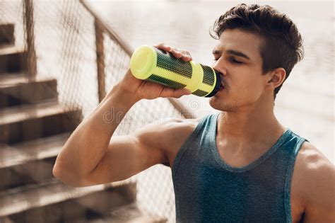 Runner Drinking Water After Exercising Stock Photo Image Of Exercise