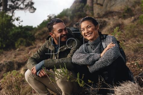 Hiking Couple Sitting On Mountain Trail Jacob Lund Photography Store