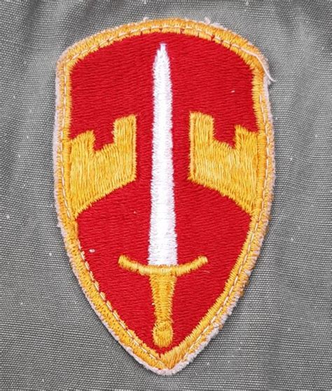 An Early Macv Color Insignia With A Raw Cut Edge