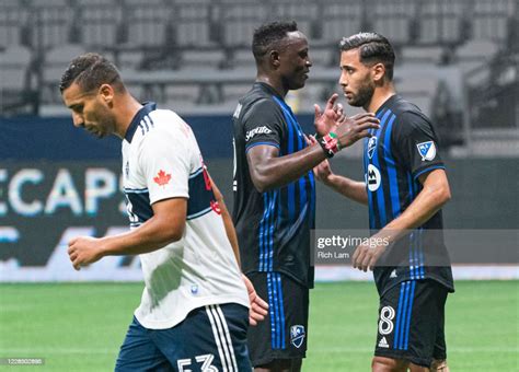Saphir Taïder Of The Montreal Impact Is Congratulated By Teammate