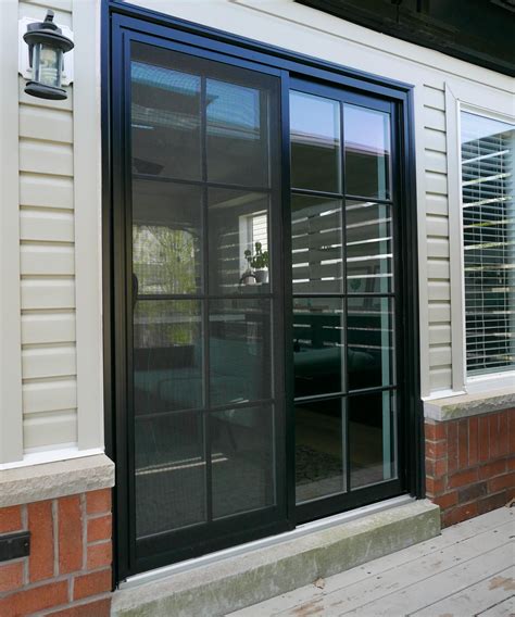 Level Up Up Your Backyard With A Black Double Sliding Patio Door With SDL Grilles Let Us