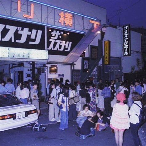 looking for pictures of japanese city life in the 90s mostly people and architecture