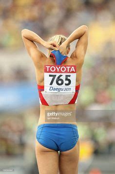 Darya Klishina Of Russia Adjust Her Kit At The End Of The Runway In