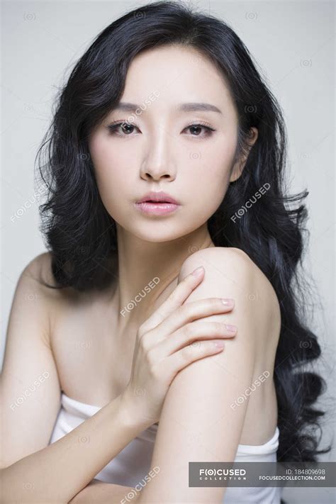 Portrait Of Beautiful Chinese Woman With Natural Makeup Model Neutral Background Stock
