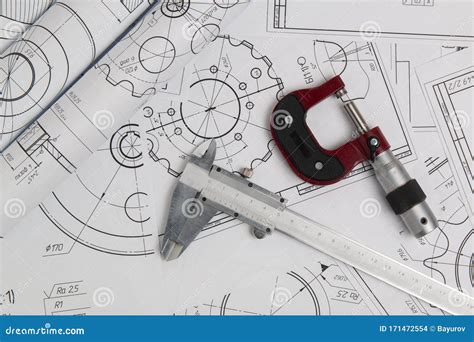 Caliper Micrometer And Engineering Drawings Of Industrial Parts Stock