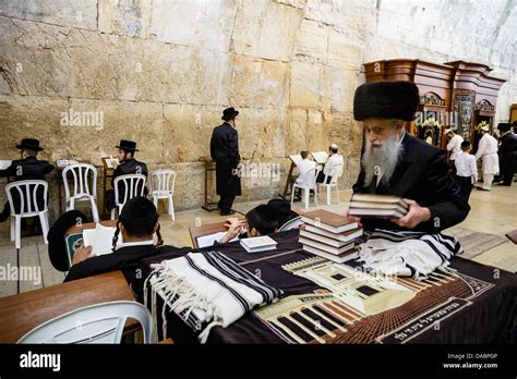 Orthodox Jewish People Praying At A Synagogue By The Western Wall Stock