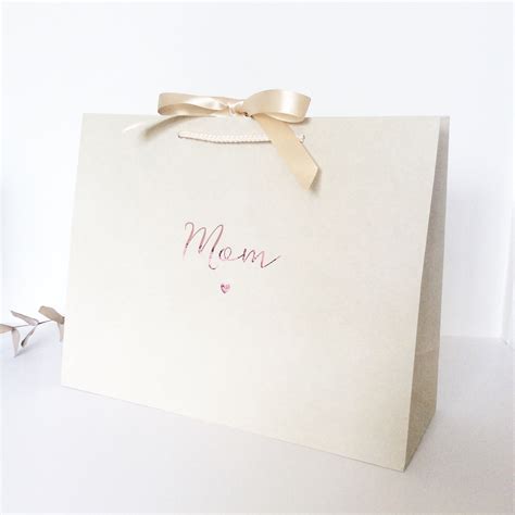 Has curated the perfect selection of gifts for the bride and groom. Personalised Luxury Wedding Gift Bag