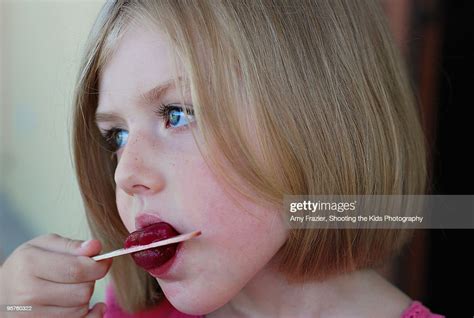 A Young Girl Eats A Popsicle Photo Getty Images