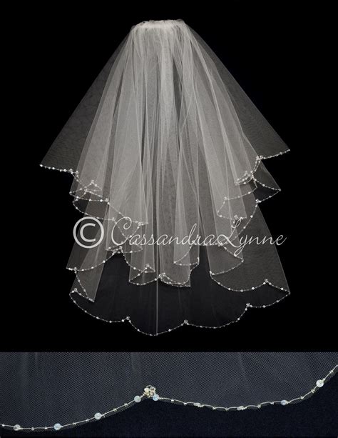 The Edge Of This Two Layer Scalloped Veil Is Styled With Silver Lined Seed Beads And Opaque