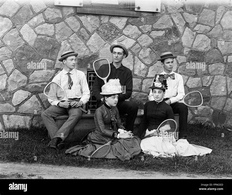 1900s Three Teenaged Boys Sitting On Bench Two Teenaged Girls Sitting