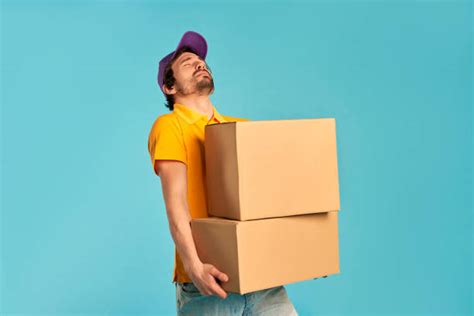 Man Carrying Big Box Stock Photos Pictures And Royalty Free Images Istock
